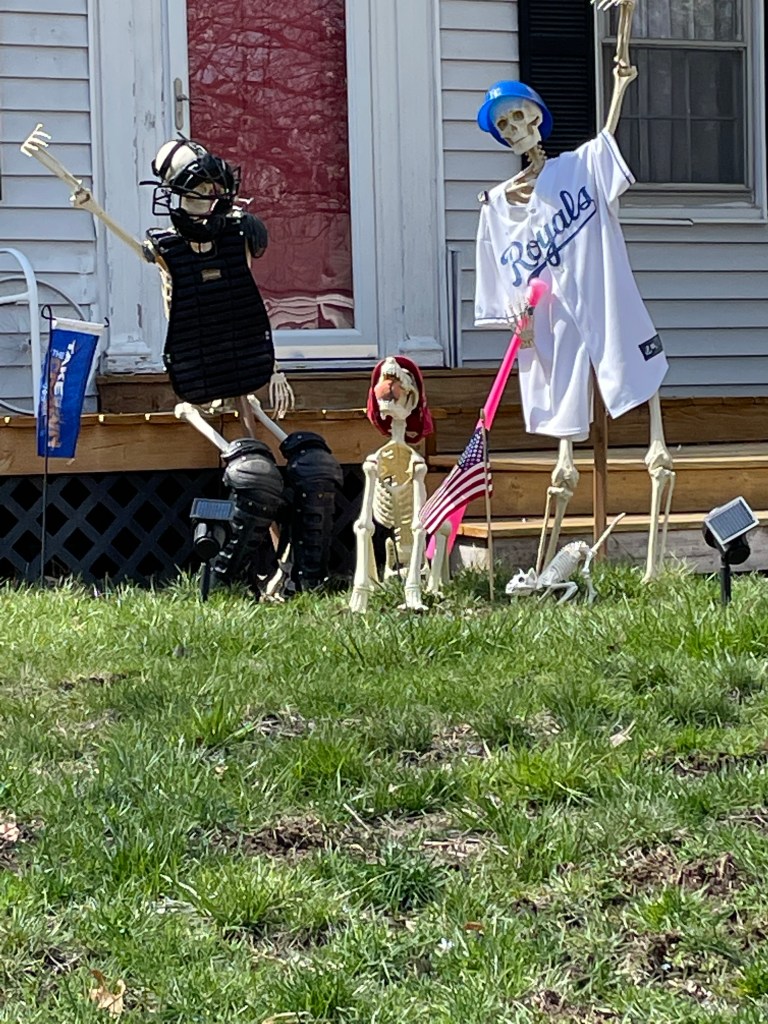 Fake skeletons in Royals baseball garb