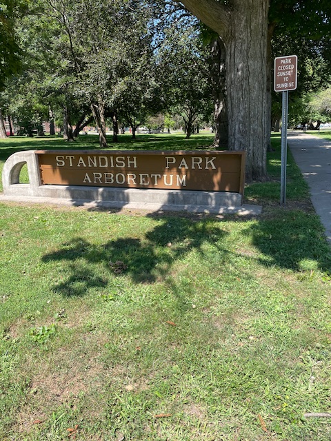 Park with large sign reading Standish Park Arboretum