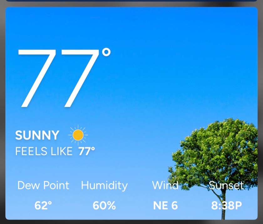 Screenshot of weather app showing 77 degrees and sunny